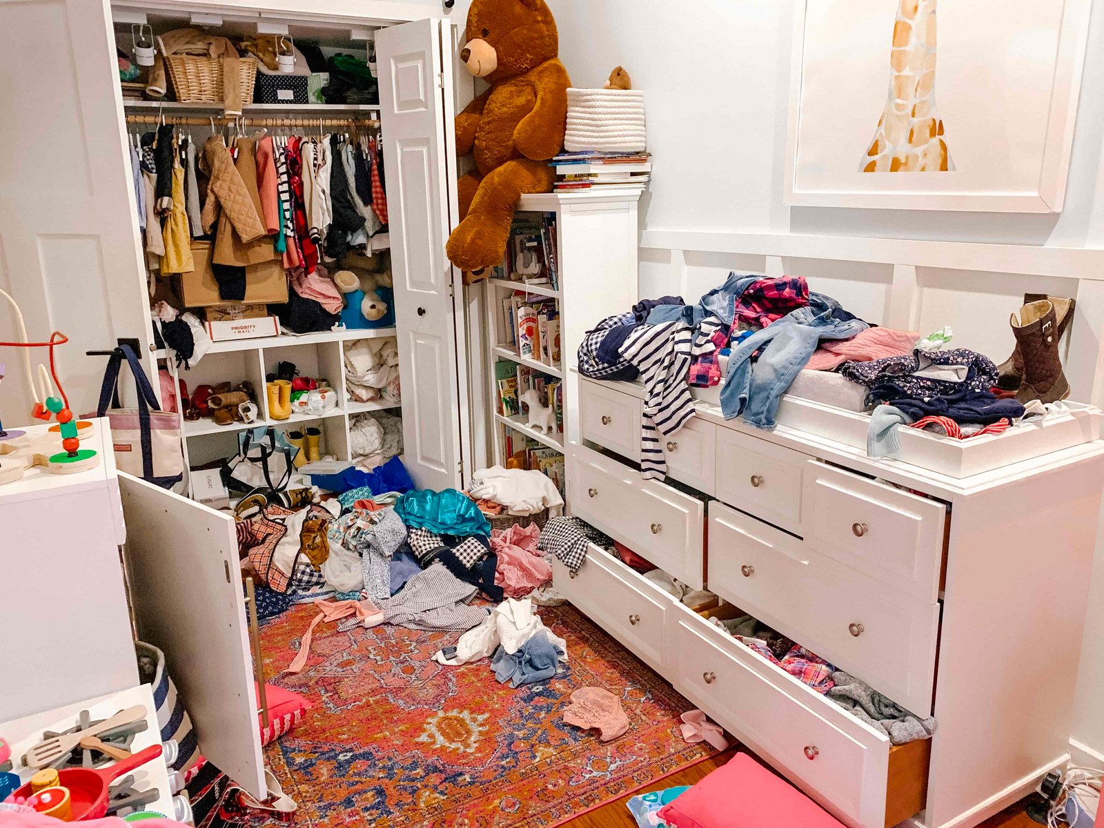 In process: This was taken right after we started emptying the contents of the dresser and closet. TERRIFYING, right? I'm only sharing because come on: your kid's room can't be worse than THIS. 😂