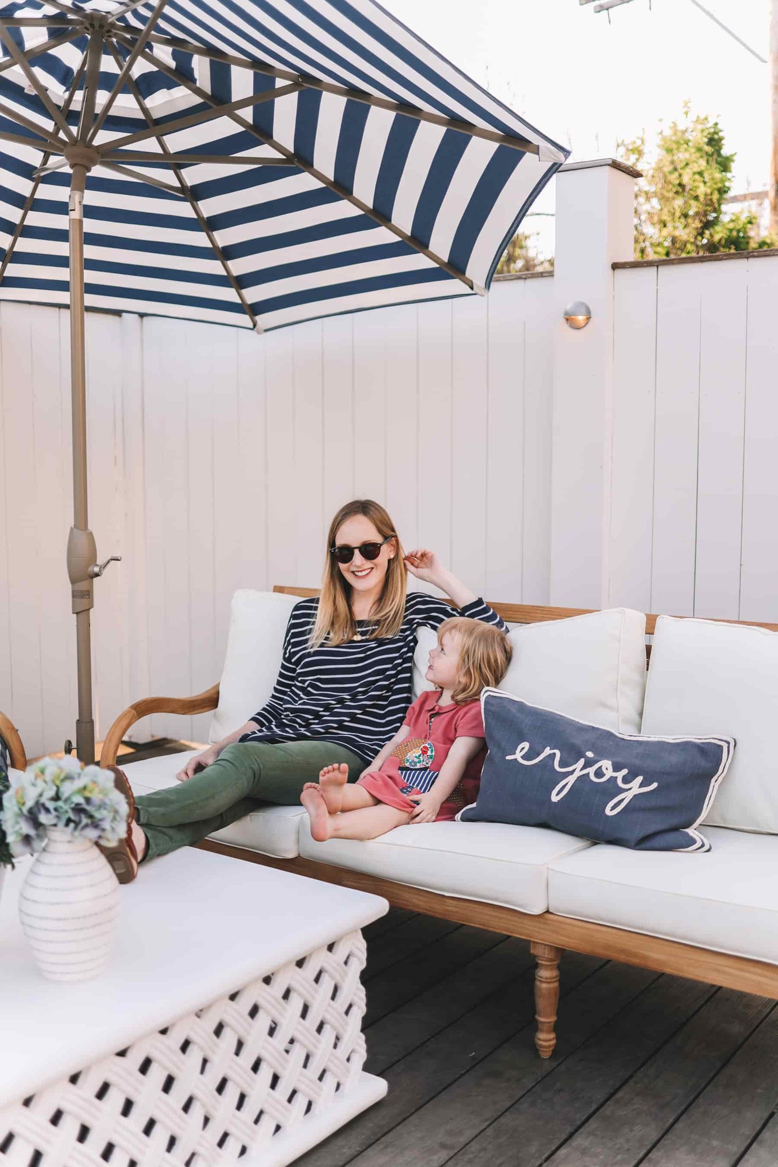happy mother enjoying her patio