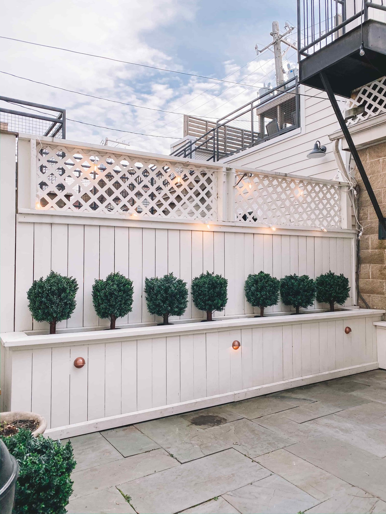Patio With The Awesome Faux Boxwoods - Minimal in the City