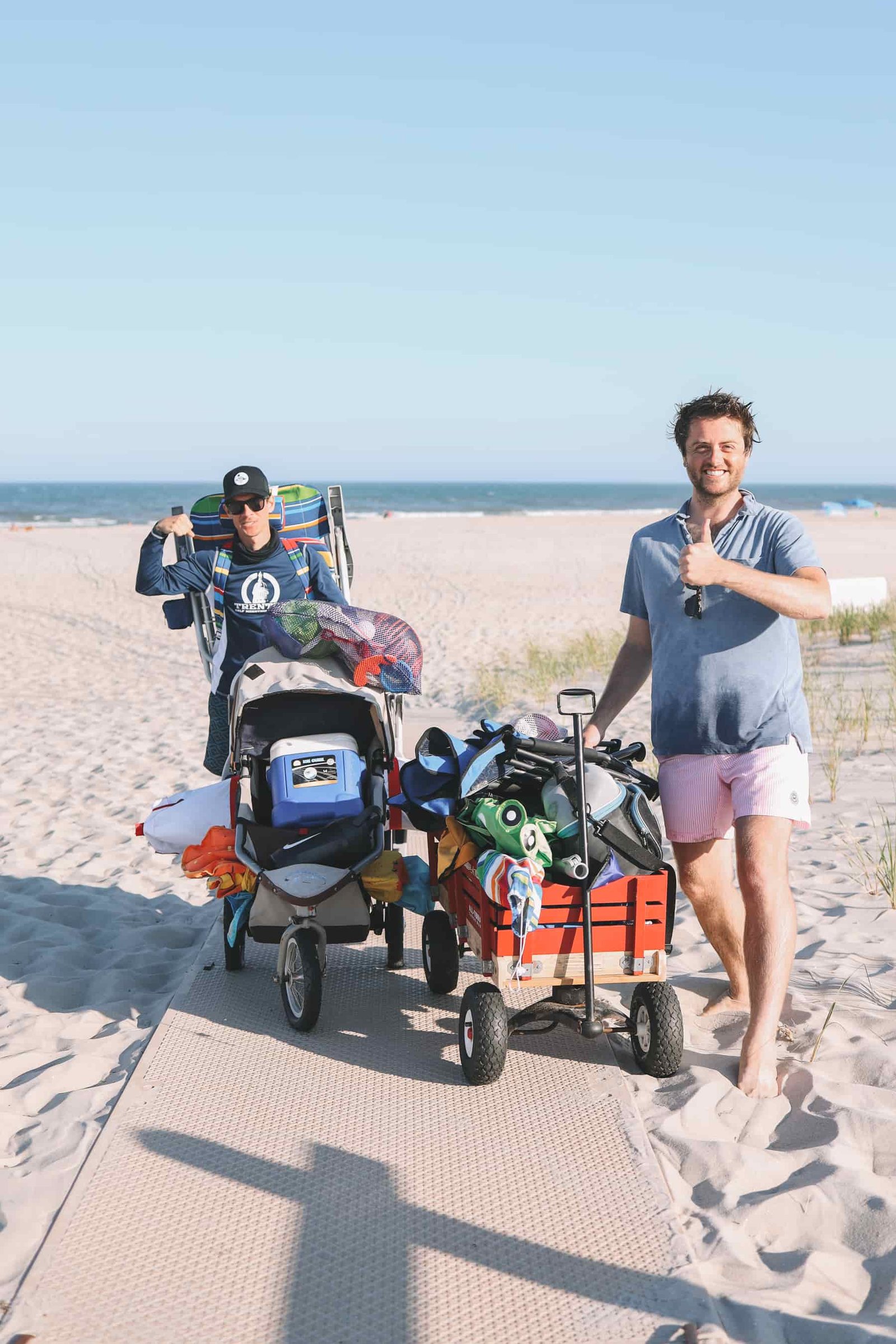 Dads with wagons at the beach Dads with wagons at the beach